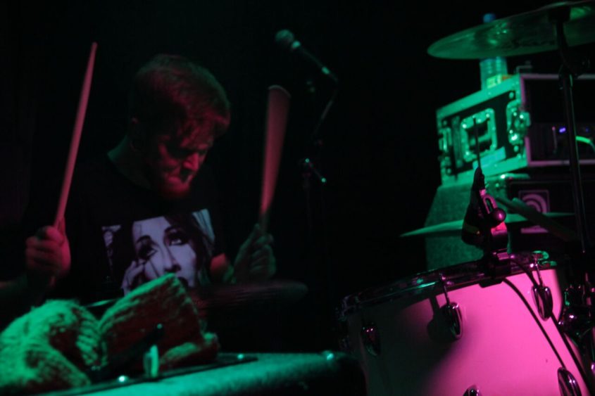 Matt Braswell on drums for Juxton Roy; photo by Travis Merchant